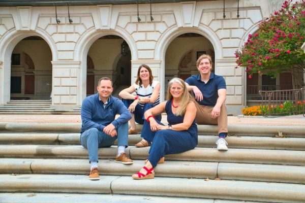 Student Athlete Advisors pose on the steps of UT-Austin
